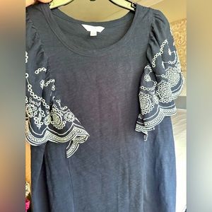 Women’s blouse size large with fringe shoulders
